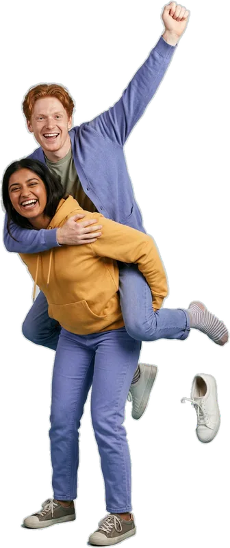 Laughing couple, one carrying the other piggyback